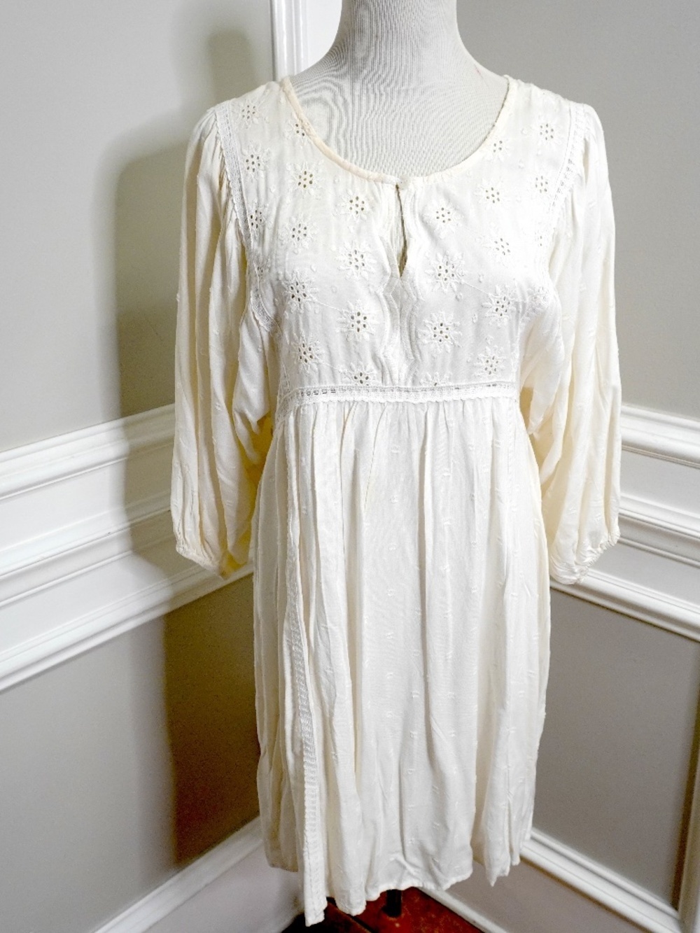 J Ghee white vintage-style white embroidered cotton dress with puffed sleeves.